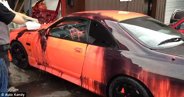 A Nissan Skyline R33, pictured, was coated with heat-sensitive paint by UK bodyshop Auto Kandy. When cold water is poured onto it, the car changes colour. The paint is what